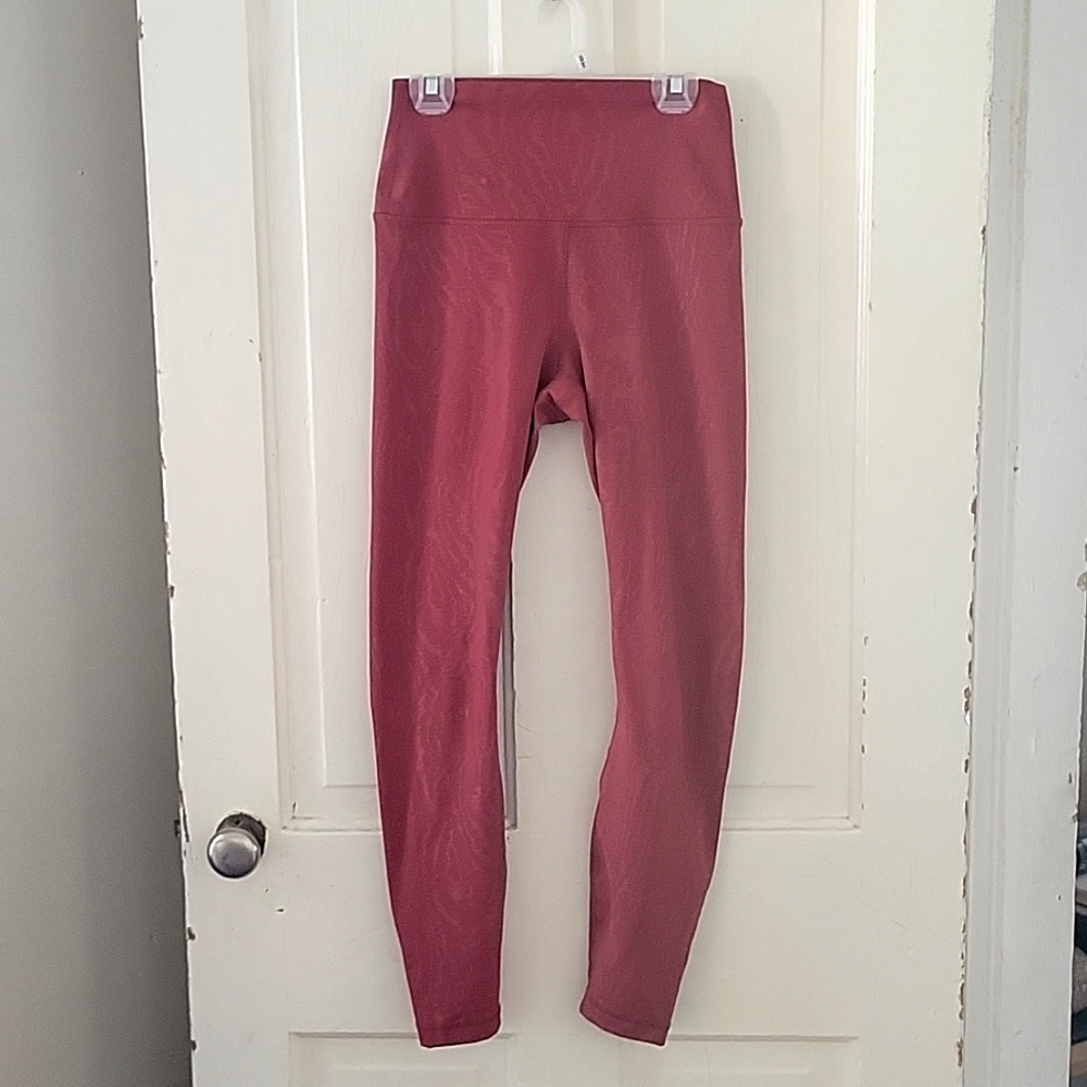 Red Adobe Leggings with Animal Pattern Detail